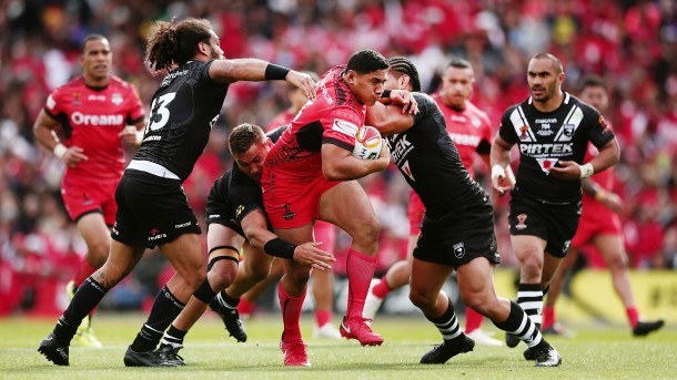 Taumalolo busts through a kiwi tackle