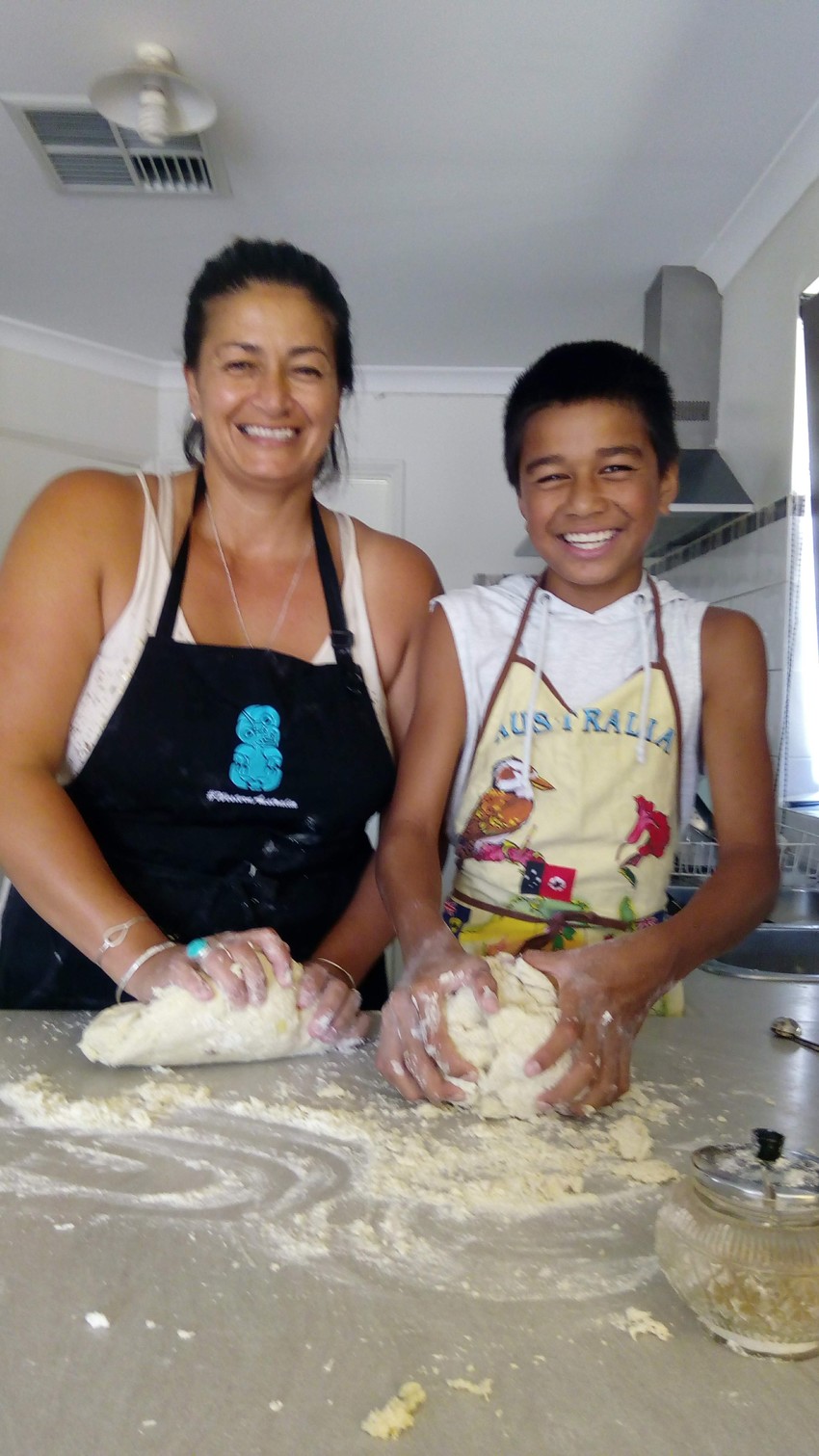 Ali-Benet (13yrs old) in the kitchen making doughnuts with Patrica