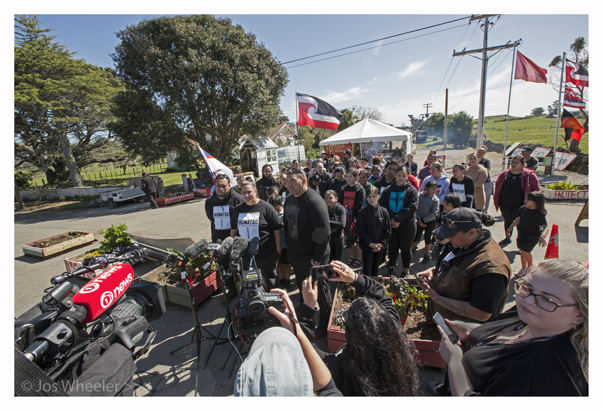 Qiane speaking to media at Ihumatao I Photo: Jos Wheeler