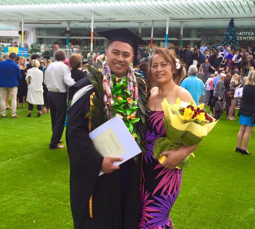Johnson with his Mum Maria after graduating with a Masters
