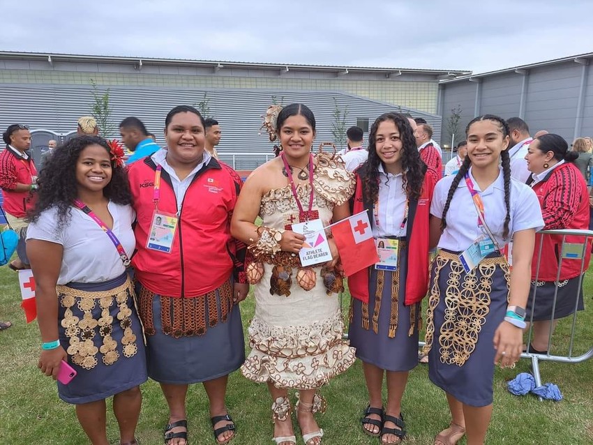 Team Tonga girls - Flag bearer/Weightlifter Kuinini Manumua in the middle